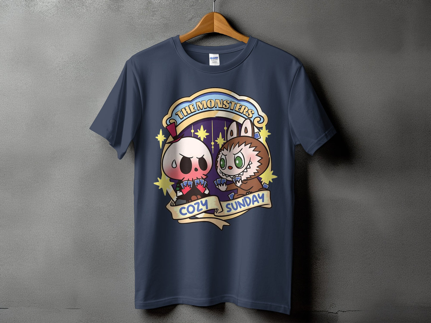 Dark blue t-shirt with "The Monsters Cozy Sunday" graphic featuring cartoon skull and werewolf characters.