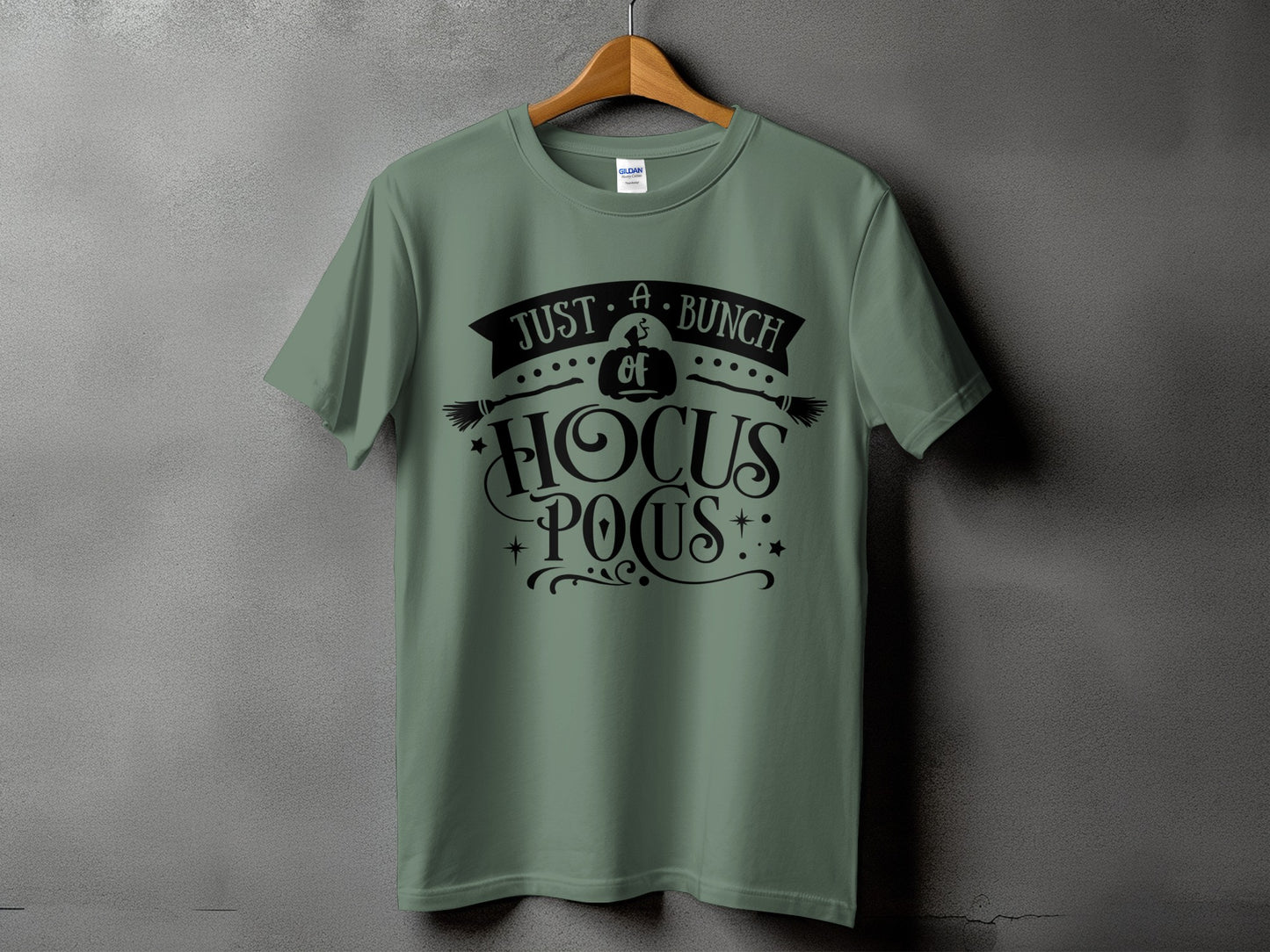 Green t-shirt with black text "Just a bunch of Hocus Pocus" and Halloween graphics.