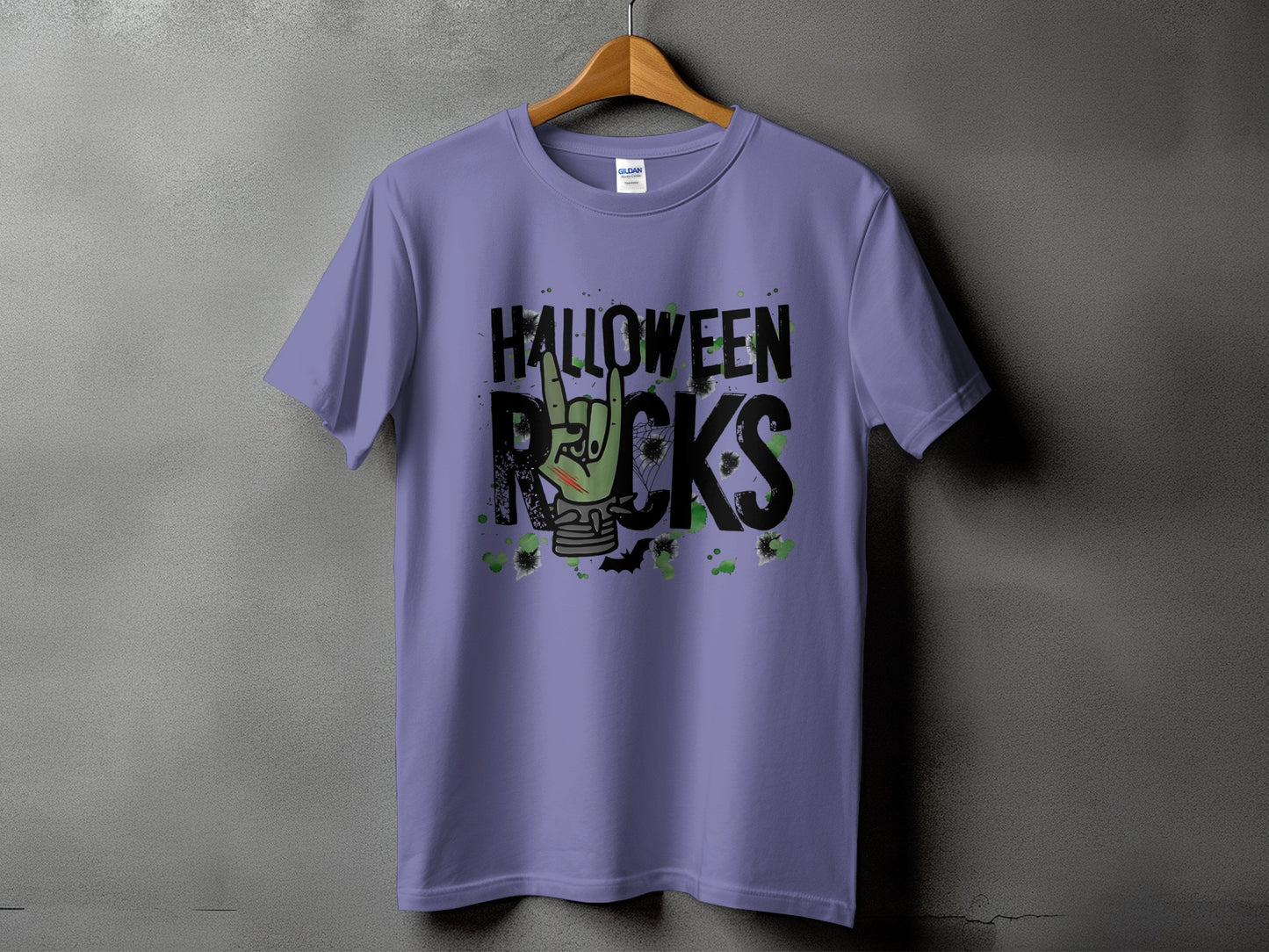 Purple t-shirt with "HALLOWEEN ROCKS" text and a green zombie hand.