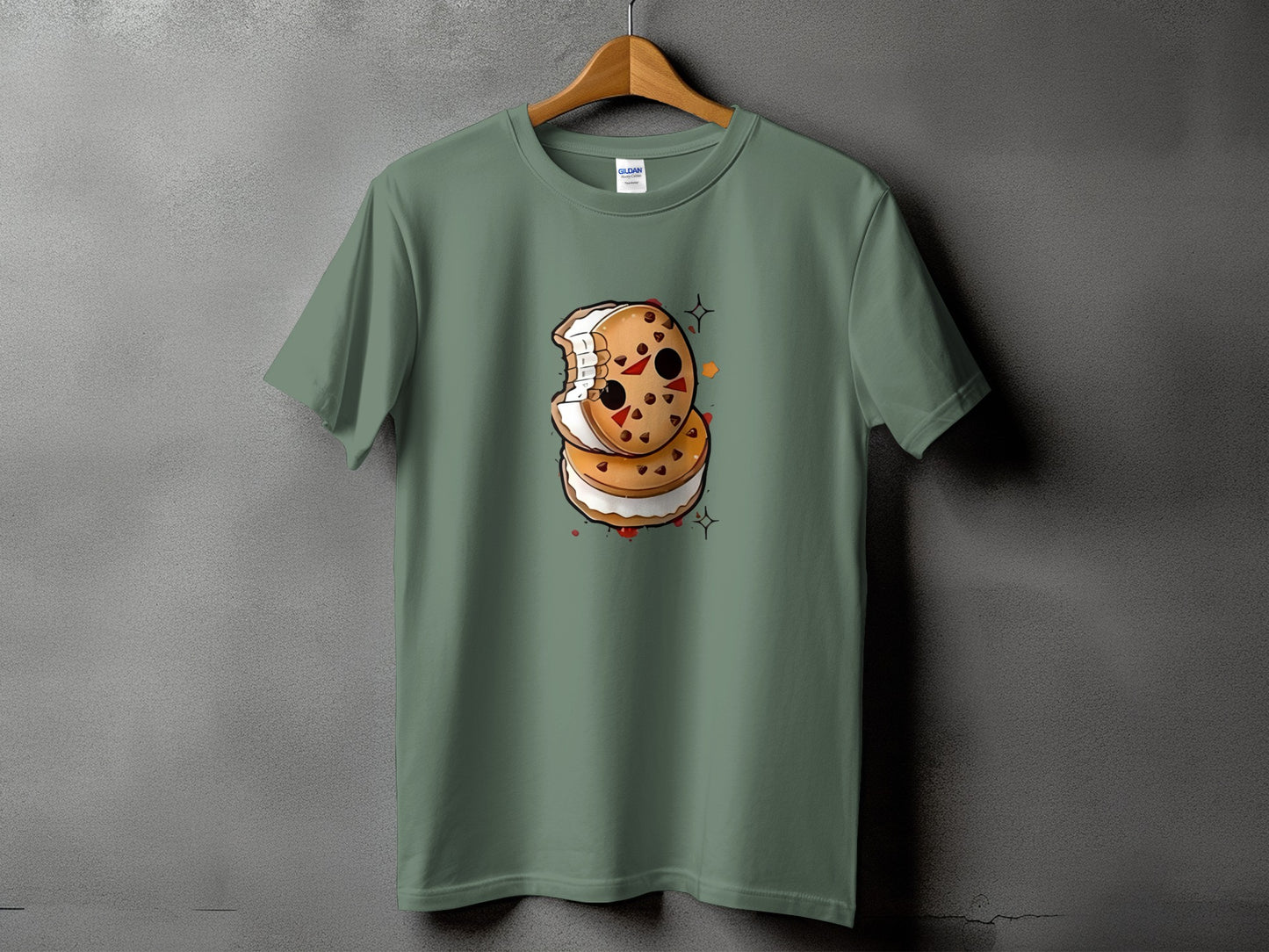 Green t-shirt with a cartoon cookie sandwich wearing a hockey mask and holding a bloody knife.