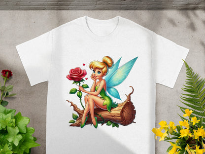 Fairy sitting on a log with a rose and hearts.