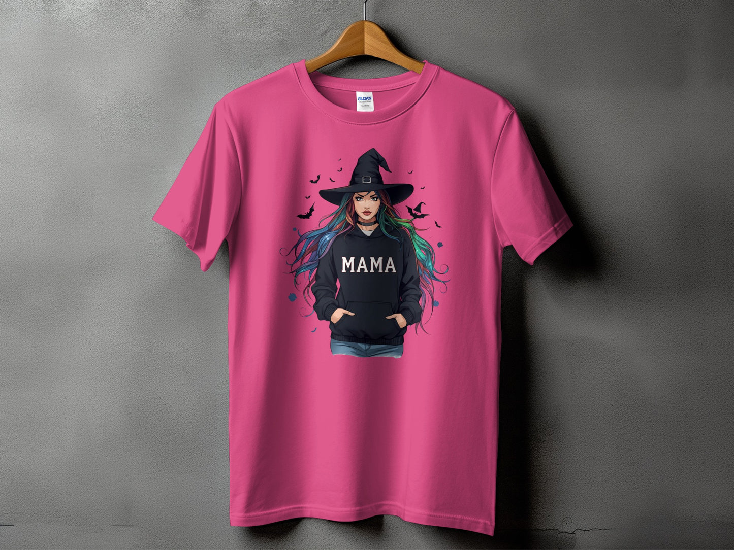 Pink t-shirt with witch graphic and "MAMA" text.