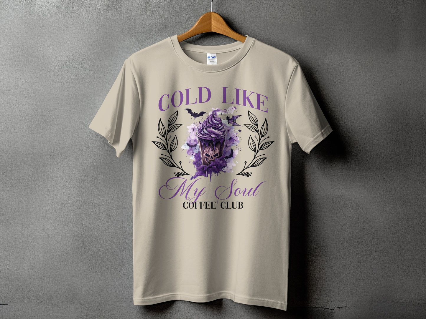 T-shirt with "COLD LIKE My Soul COFFEE CLUB" text and gothic coffee cup graphic.