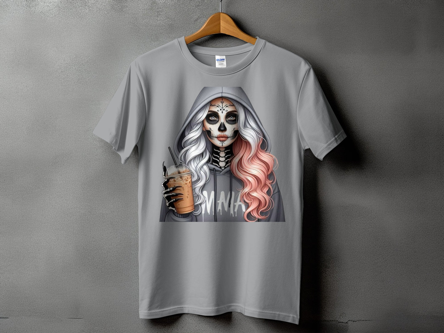 Grey t-shirt with skeleton makeup woman holding iced coffee and "MMA" text.