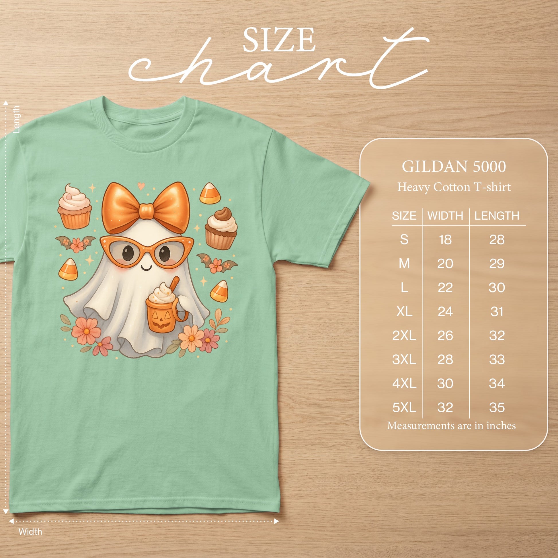 Mint green Gildan 5000 t-shirt with cartoon ghost graphic and size chart.