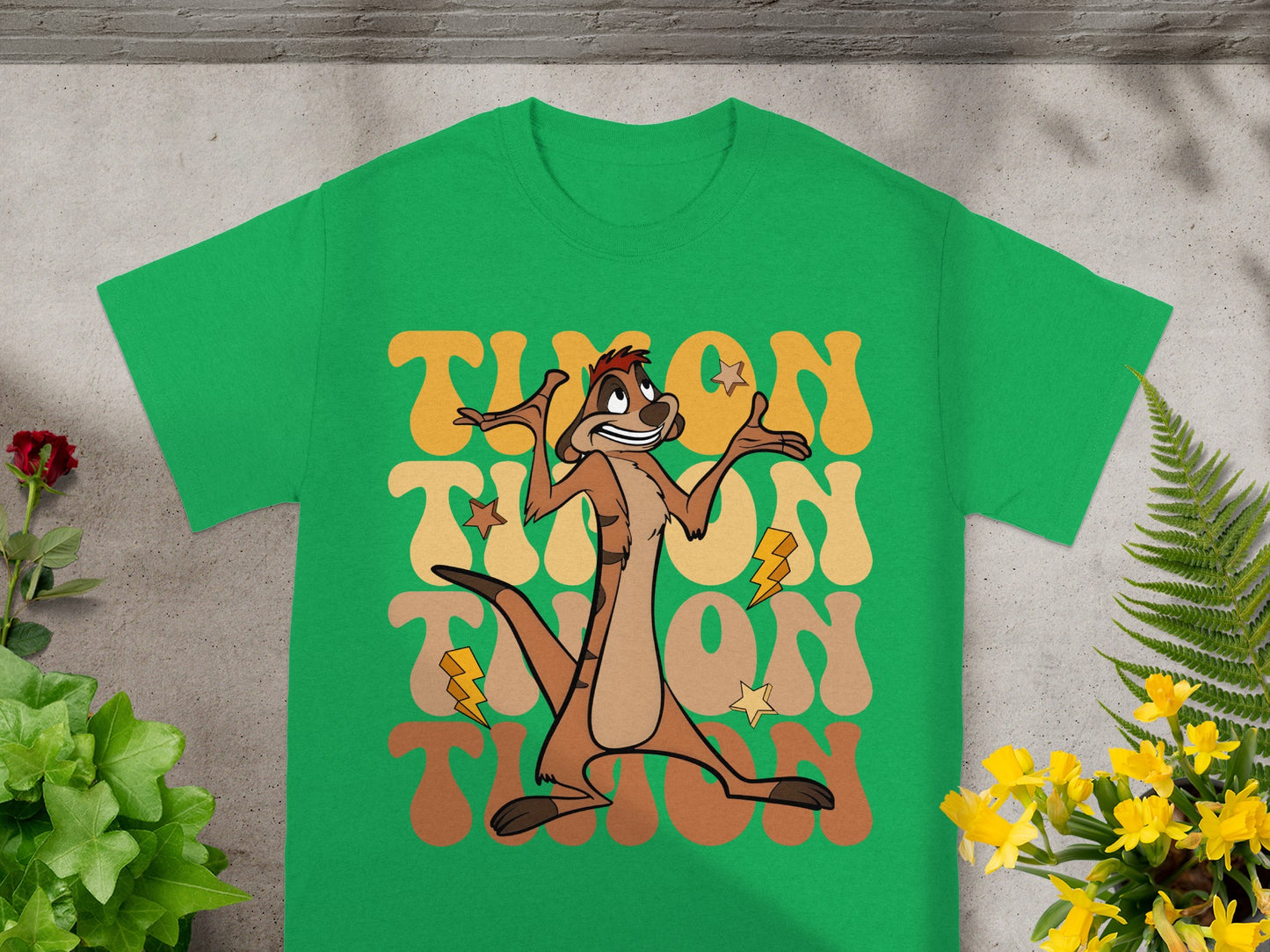 Green t-shirt with repeating "Timon" text and lightning bolt graphics.