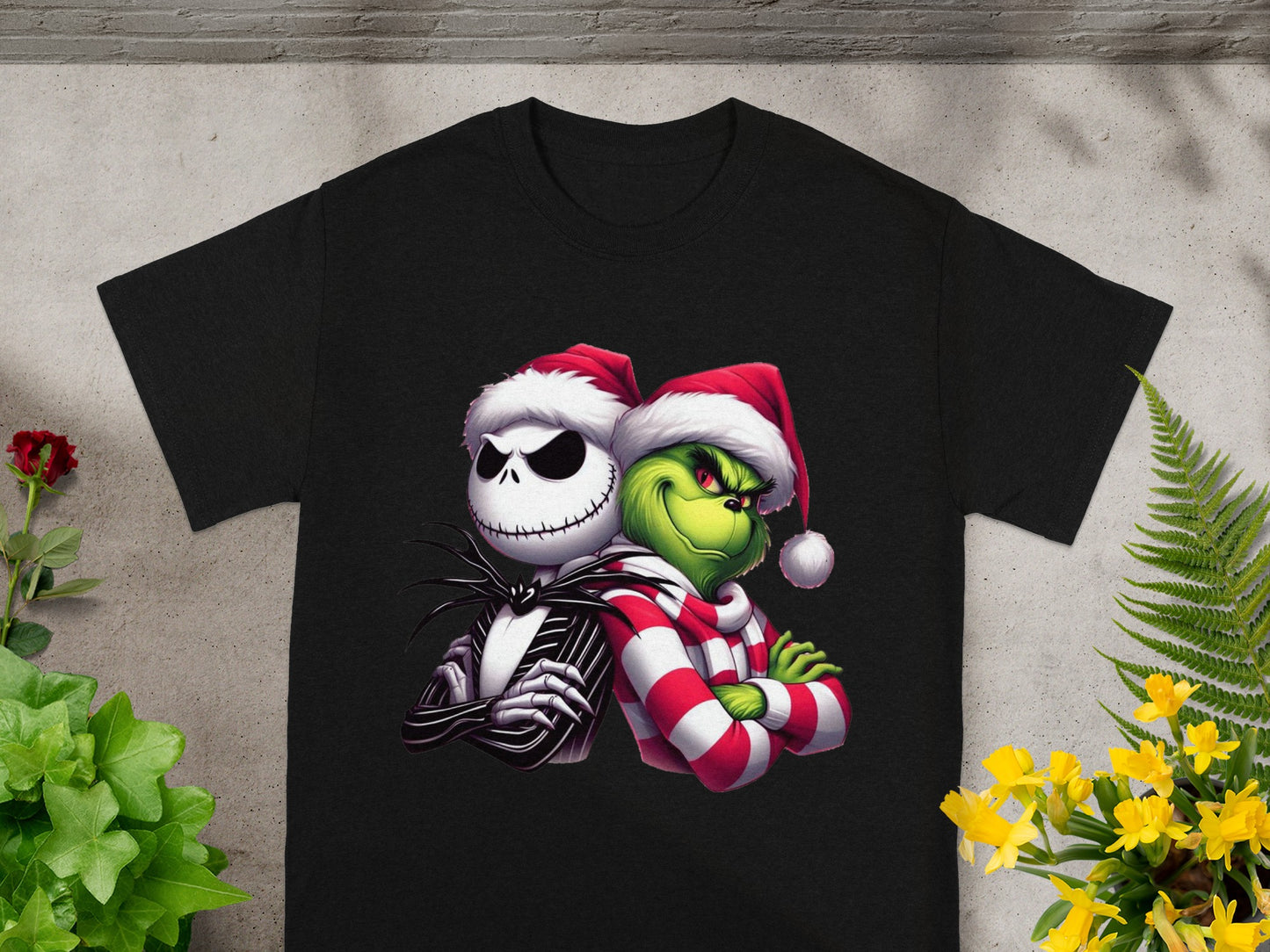 Black t-shirt with Jack Skellington and Grinch wearing Santa hats.