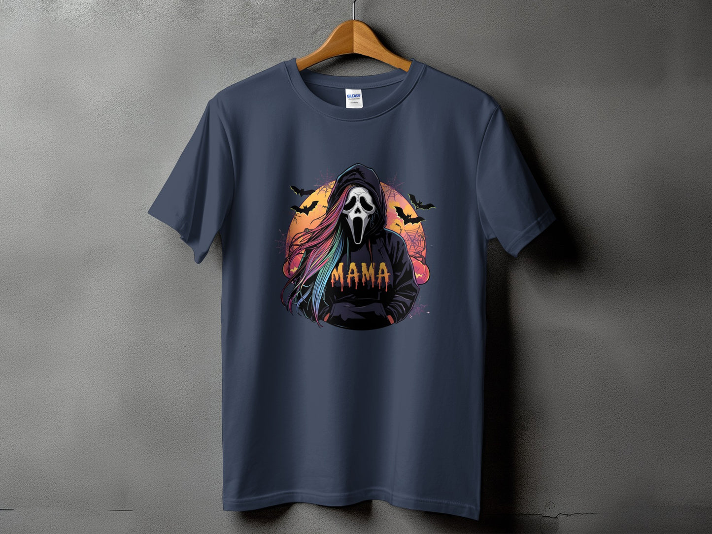 T-shirt graphic with ghost mask, colorful hair, bats, and "MAMA" text.