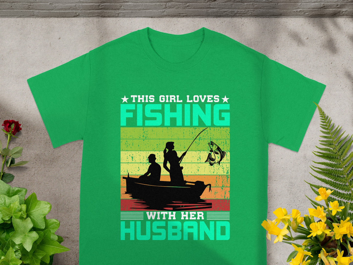 This girl loves fishing with her husband graphic tee.
