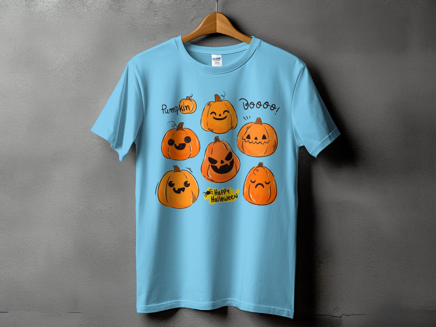 Light blue t-shirt with cartoon pumpkins and "Pumpkin," "Dooo!", and "Happy Halloween" text.