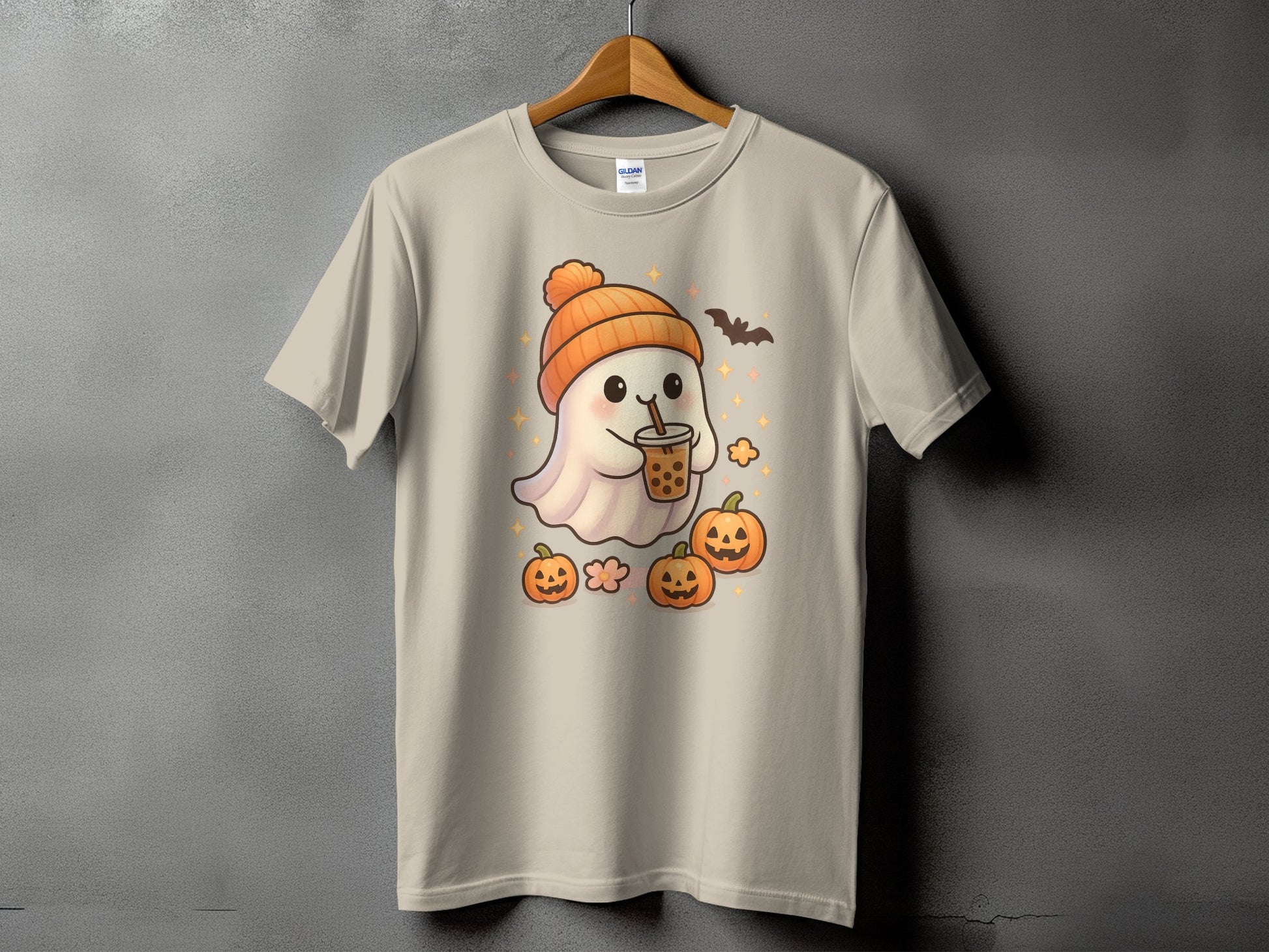Cute ghost wearing orange hat holding bubble tea, surrounded by pumpkins and stars.