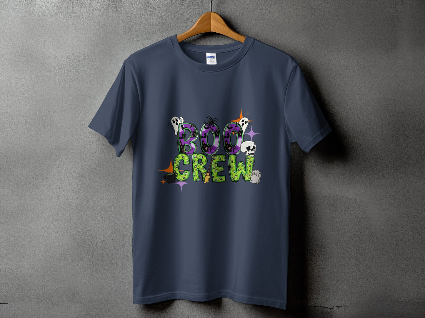 Navy t-shirt with "Boo Crew" Halloween graphic featuring ghosts, skulls, and pumpkins.