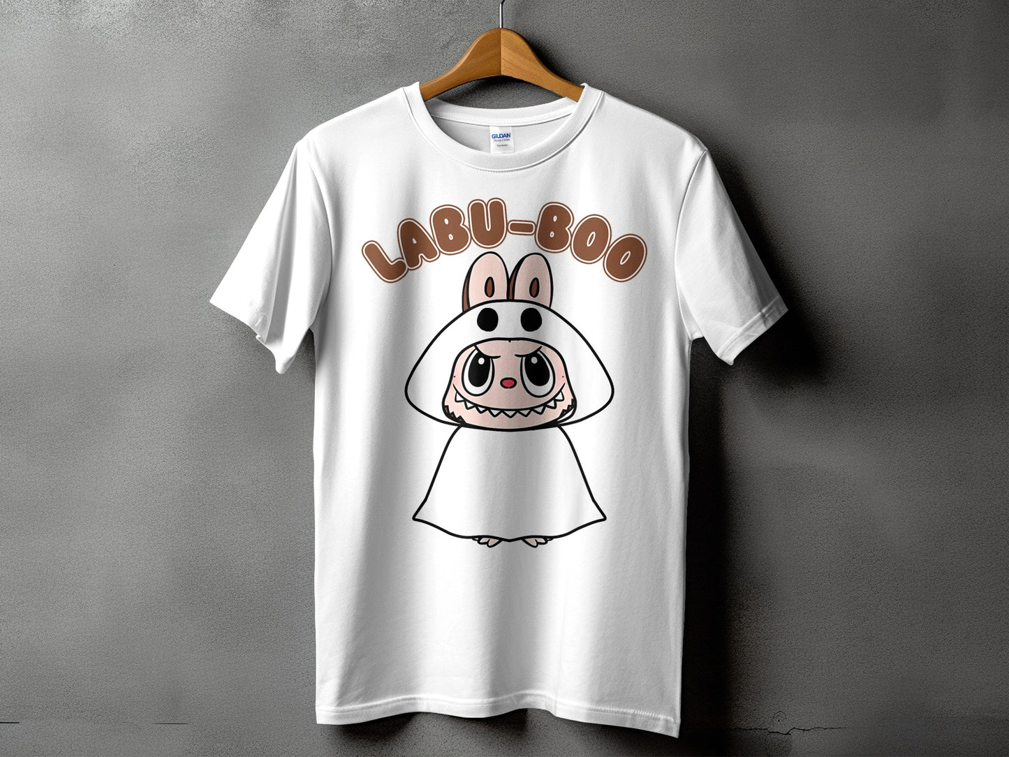 White t-shirt with "LABU-BOO" text and cartoon character in a ghost costume.