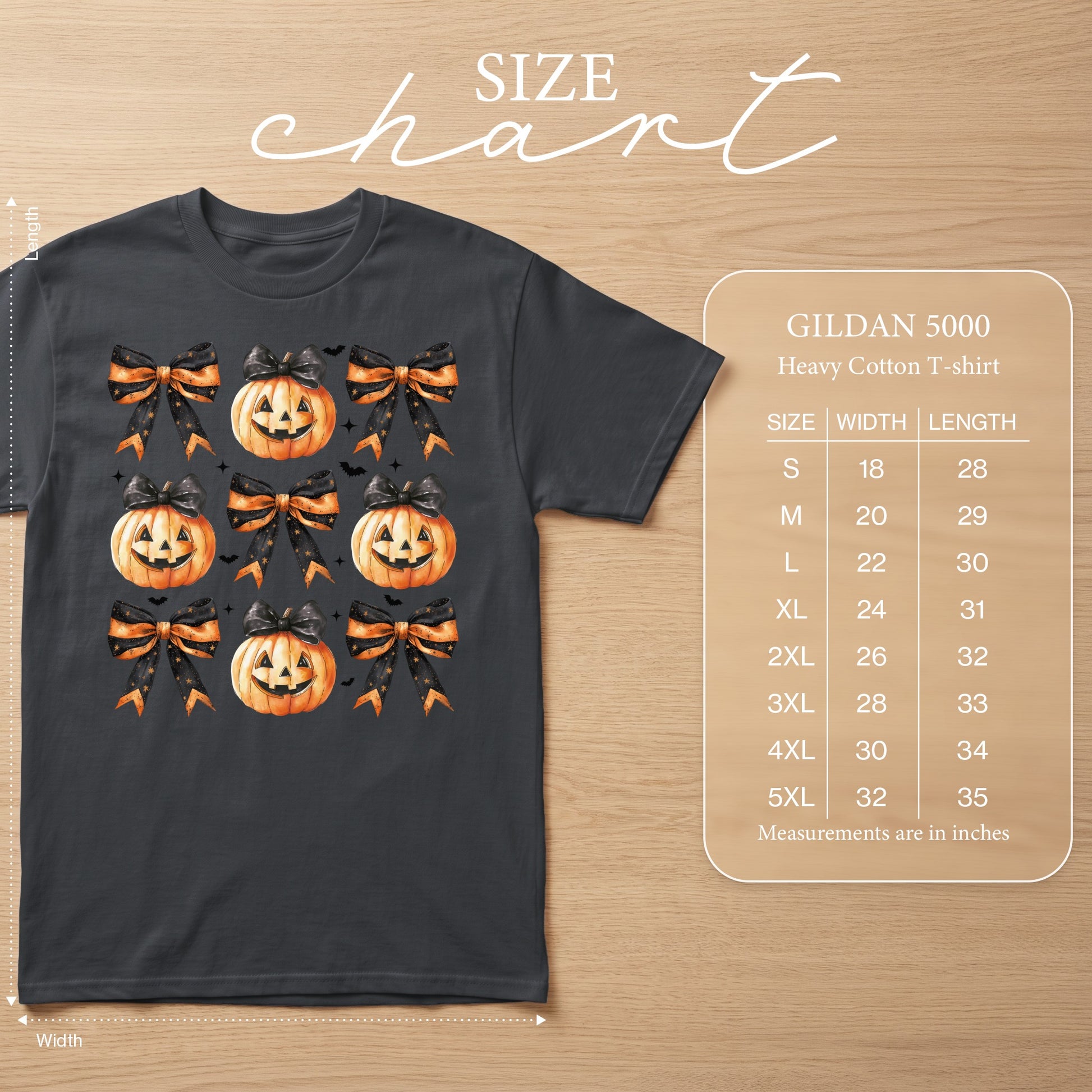 Dark grey t-shirt with repeating jack-o'-lantern and bow pattern and Gildan size chart.