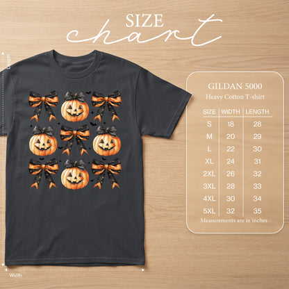 Dark grey t-shirt with repeating jack-o'-lantern and bow pattern and Gildan size chart.