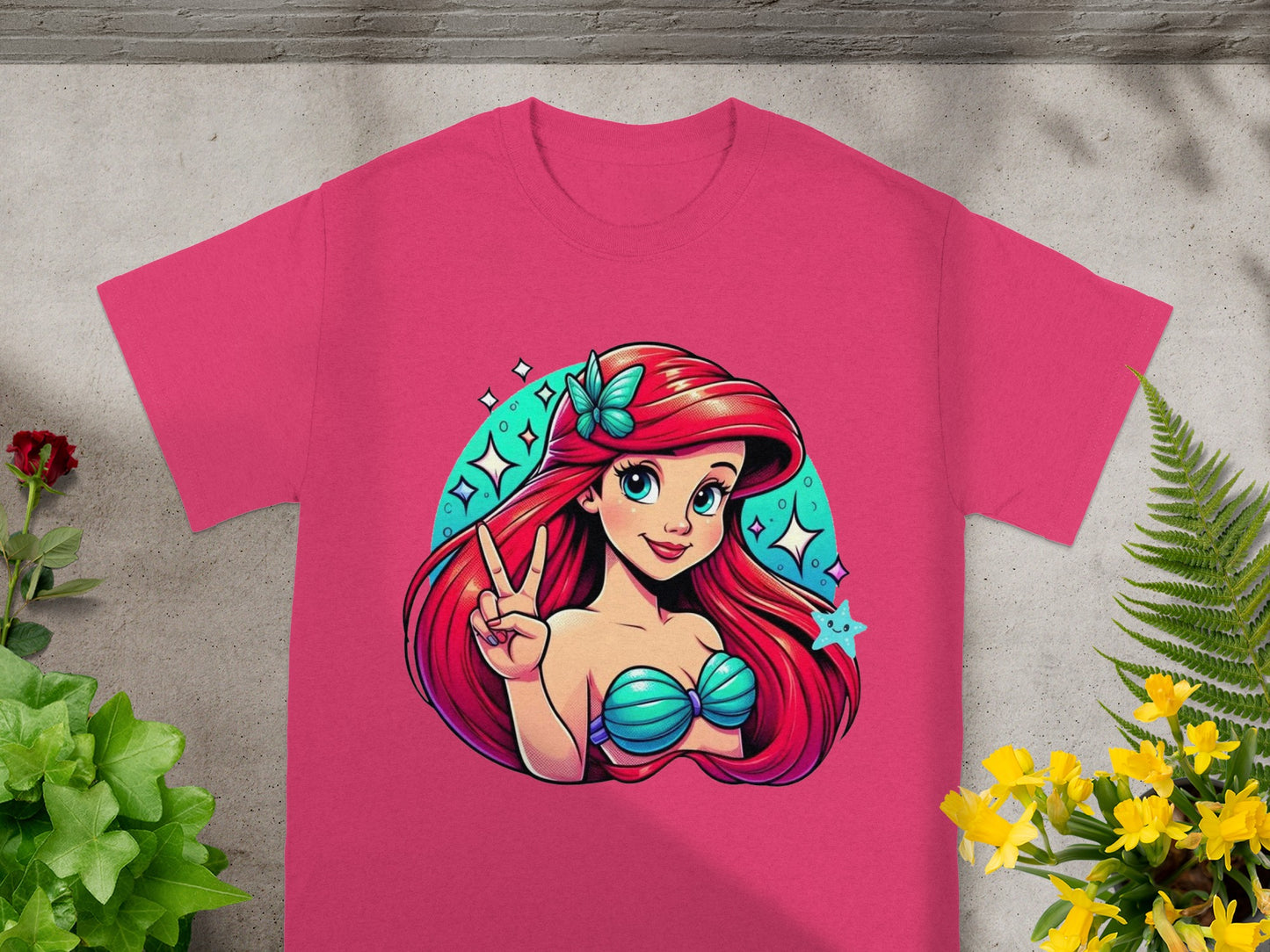 T-shirt featuring Ariel from The Little Mermaid making a peace sign.