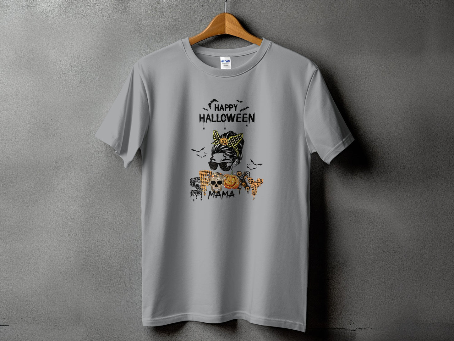 Grey t-shirt with "Happy Halloween" and a messy bun skull design with pumpkins.