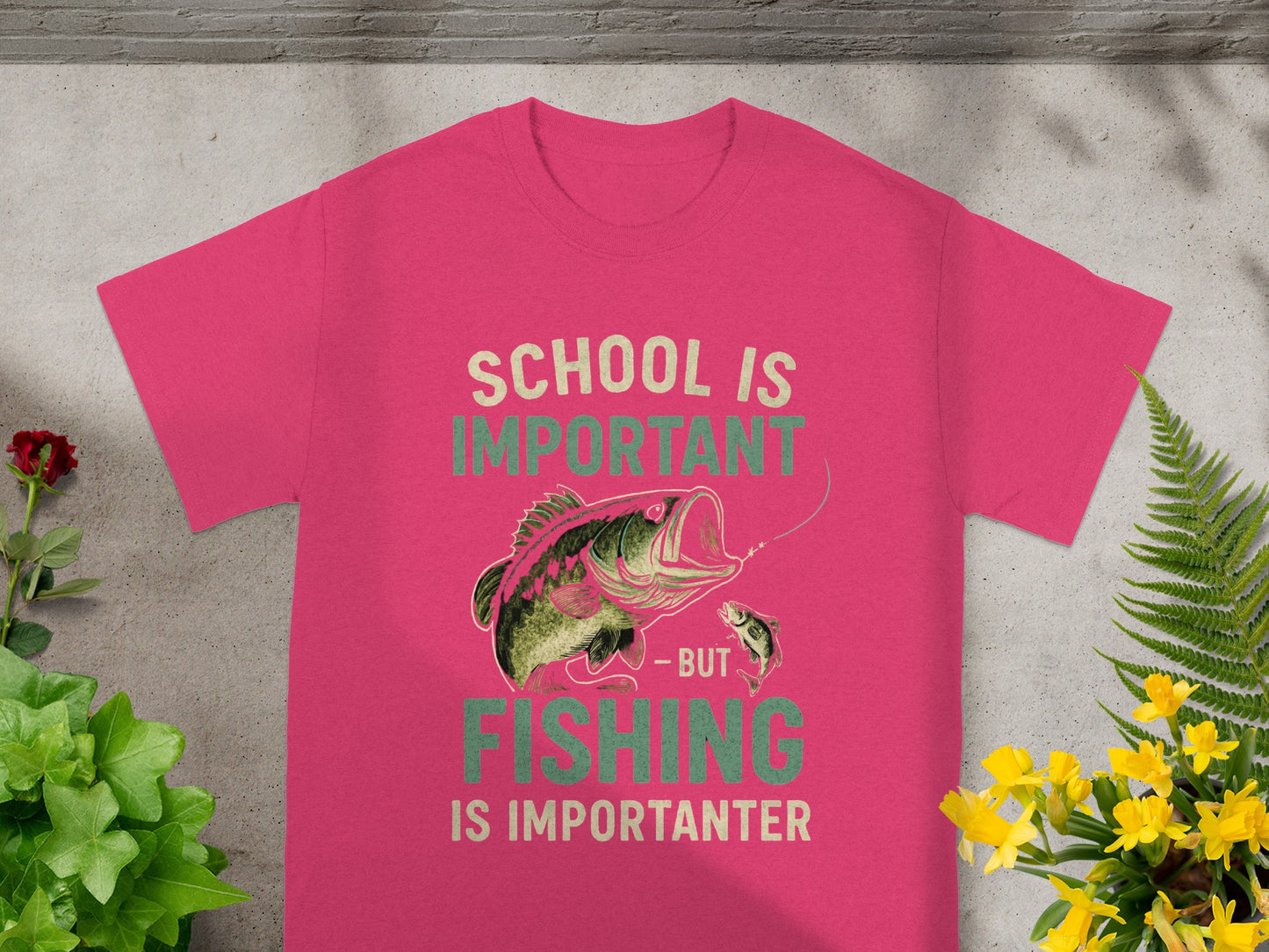 Pink t-shirt with "School is Important - But Fishing is Importanter" text and fishing graphic.