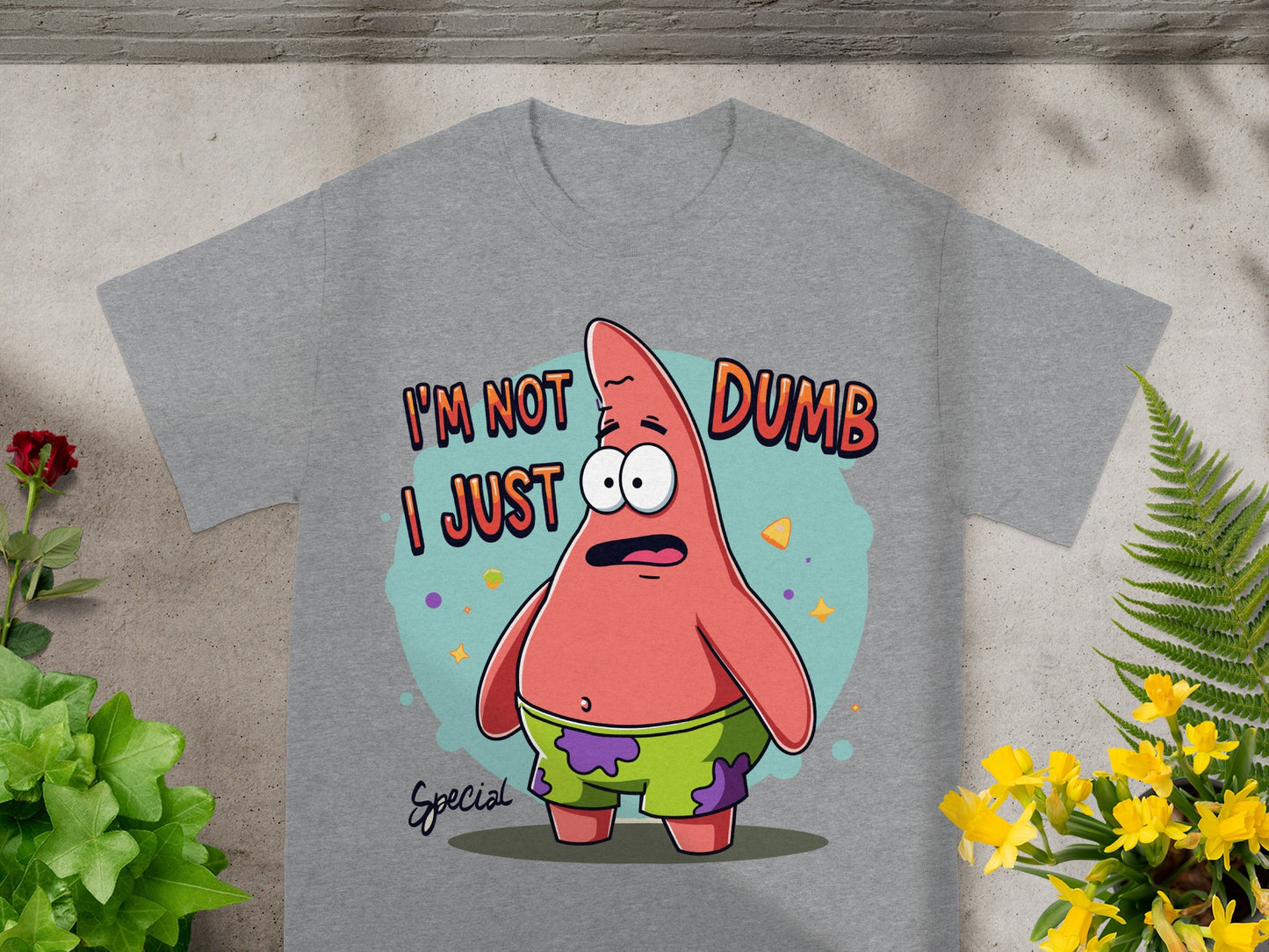 Patrick Star from Spongebob Squarepants wearing shorts with text "I'M NOT I JUST DUMB".