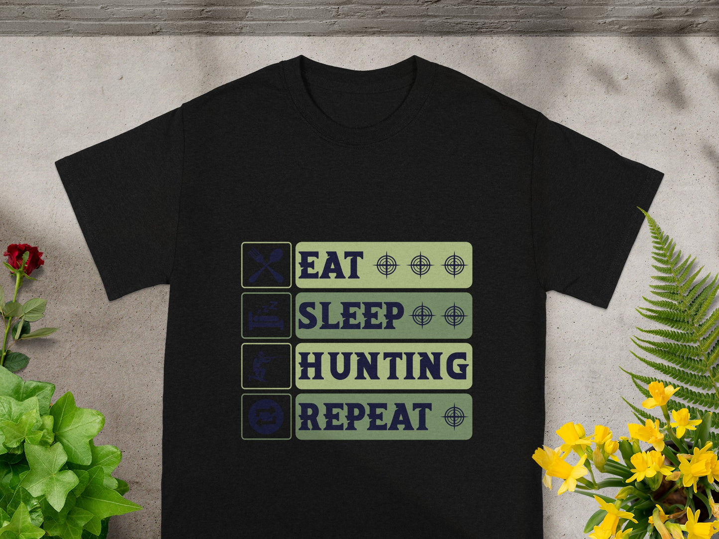 Black t-shirt with "Eat, Sleep, Hunting, Repeat" text and hunting-themed icons.