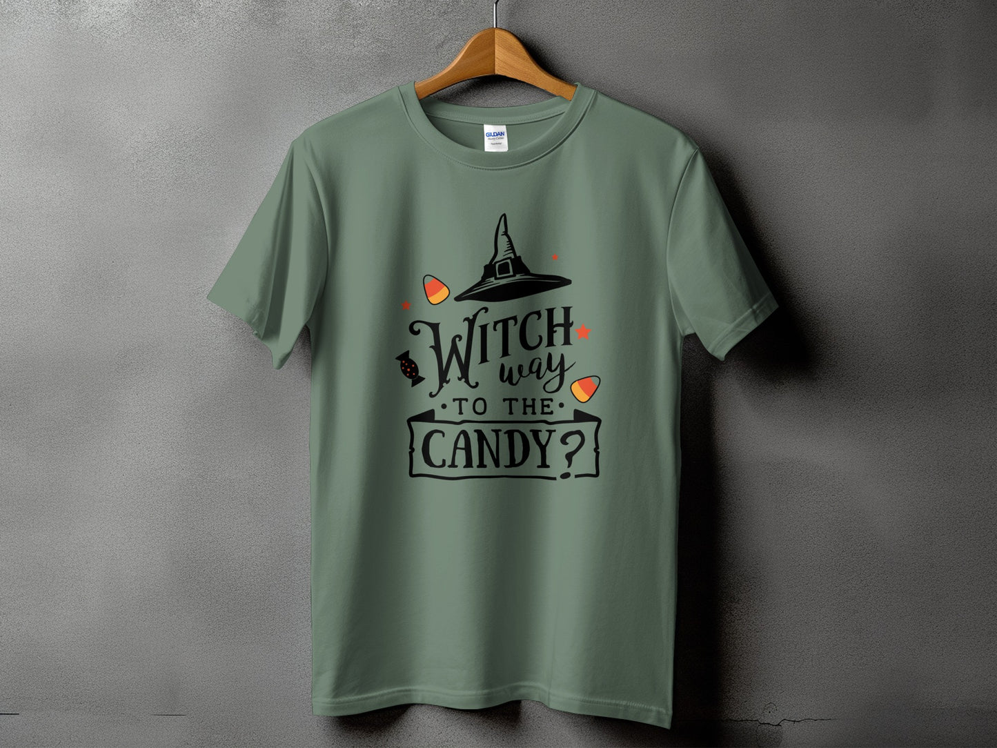 Green t-shirt with witch hat graphic and text "Witch way to the candy?".