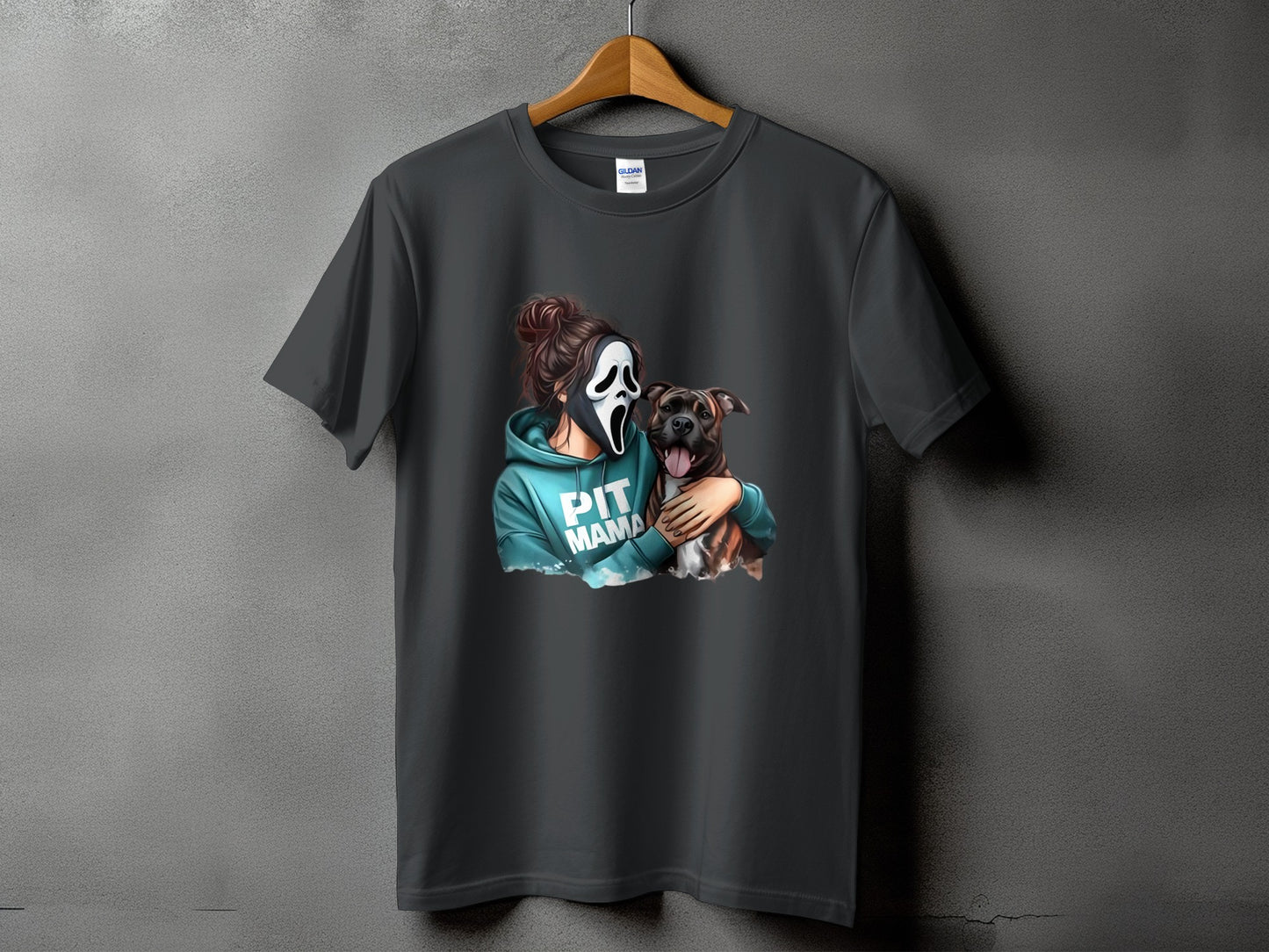 Dark grey t-shirt with graphic of person wearing scream mask hugging pit bull, text reads "PIT MAMA".