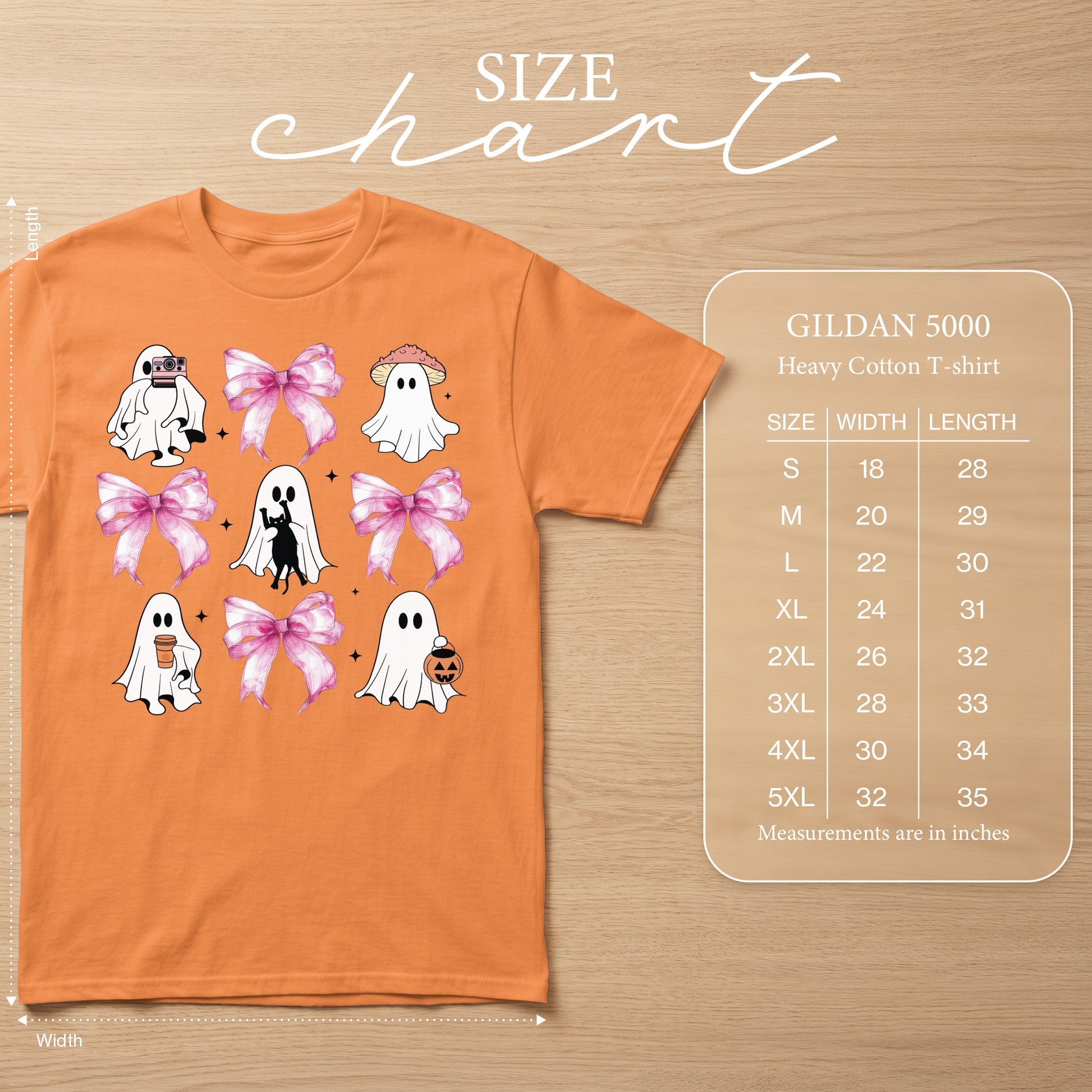 Orange Gildan 5000 t-shirt with ghosts, bows, and Halloween motifs. Size chart included.