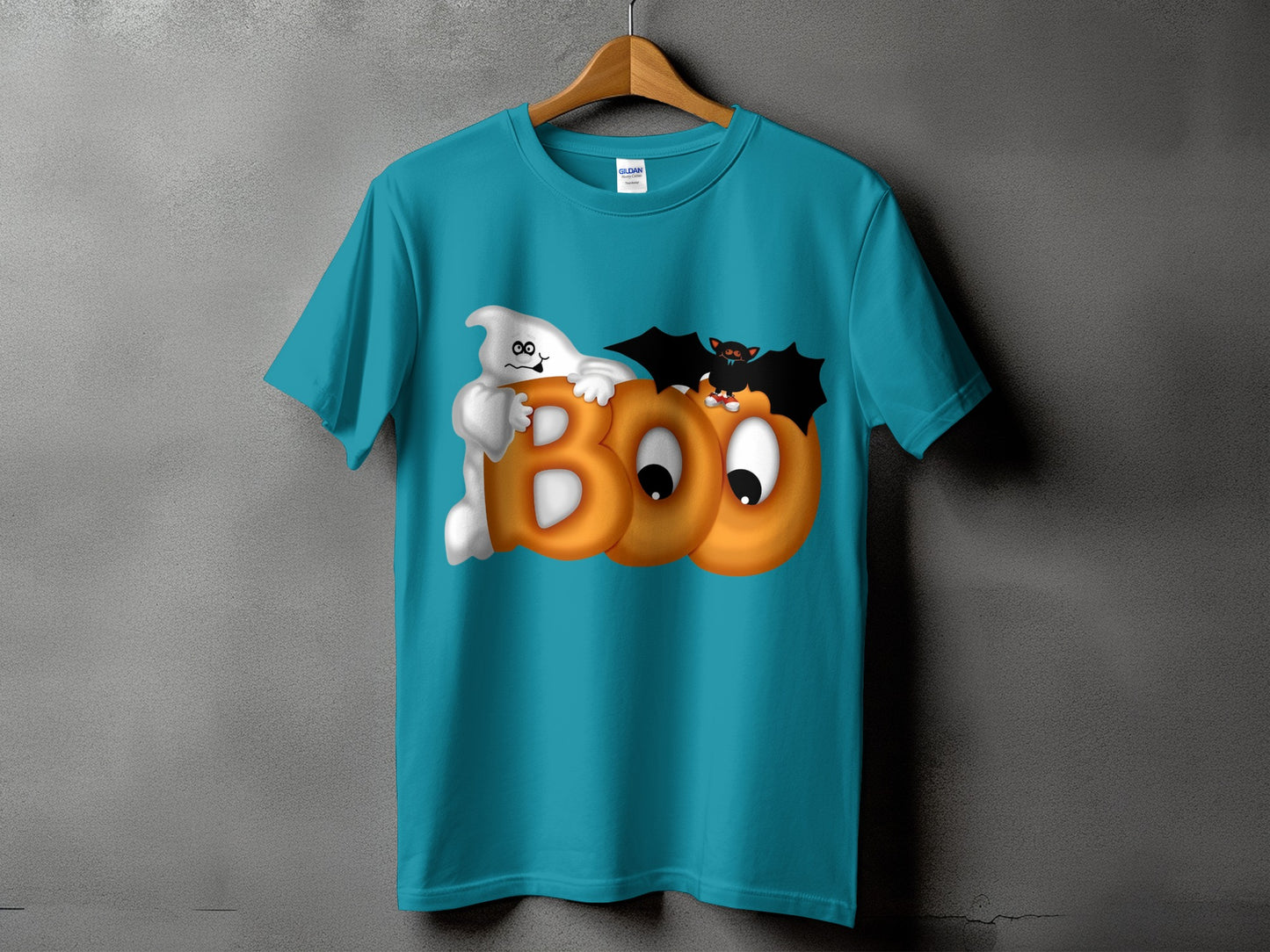Teal t-shirt with ghost, bats, and "BOO" text graphic for Halloween.