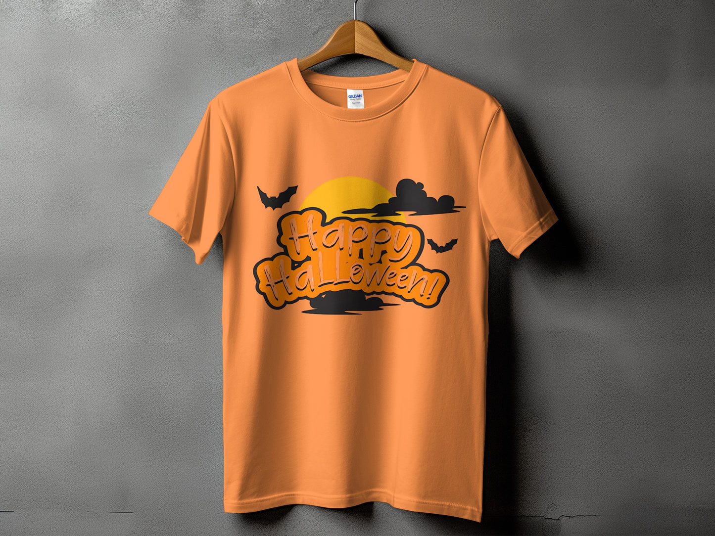 Orange t-shirt with "Happy Halloween!" text and bats against a sunset and clouds.