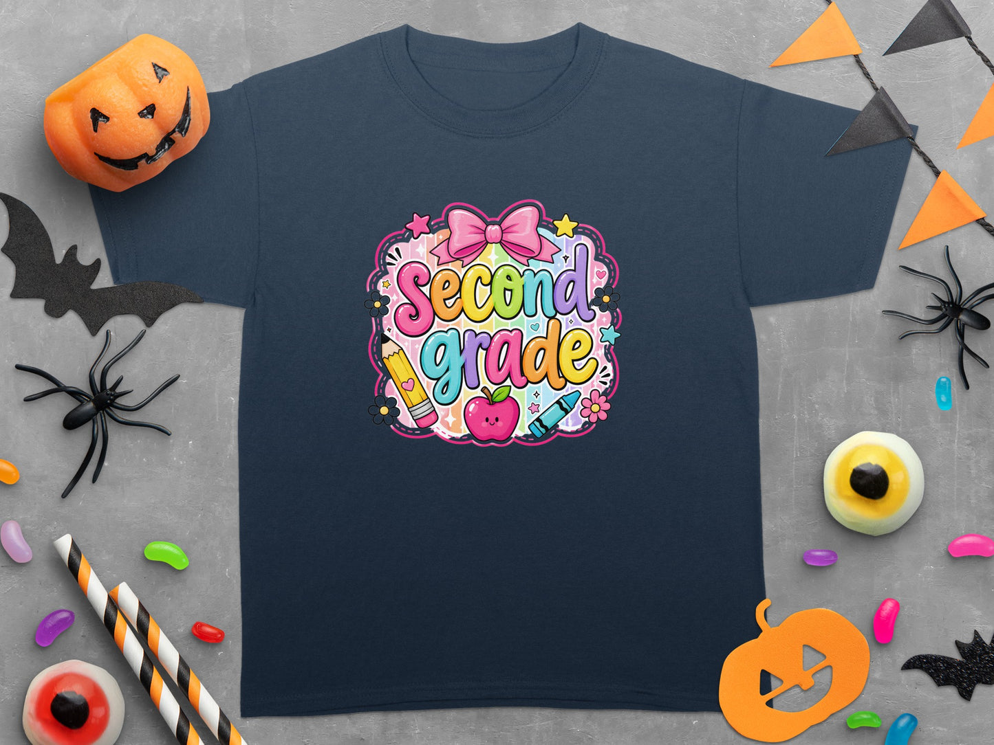 Navy t-shirt with "Second Grade" design featuring pink bow, apple, pencil, and crayon.