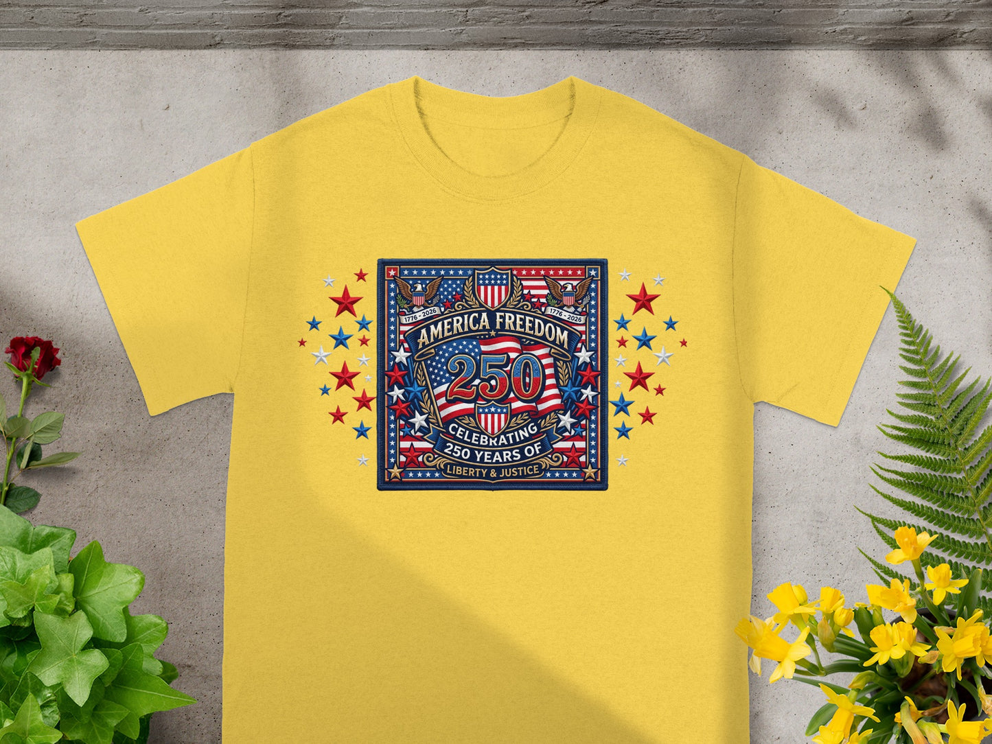 Yellow t-shirt with "America Freedom" graphic celebrating 250 years.