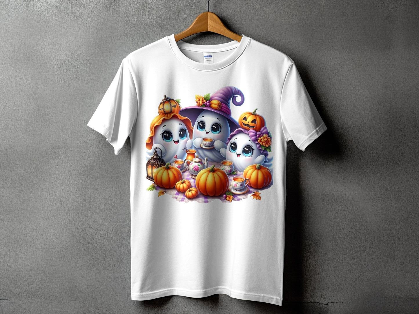 Three cute ghosts with pumpkins and tea set on a white t-shirt.