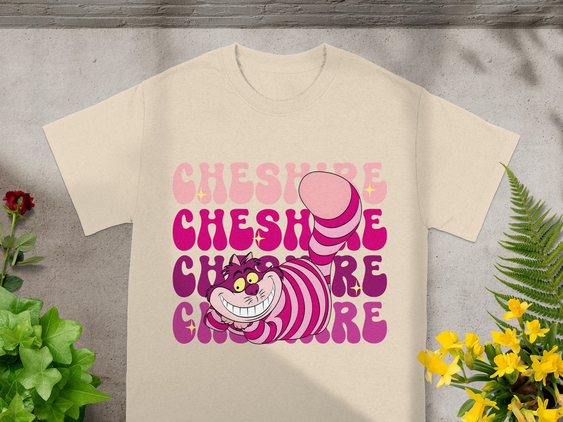 Cheshire Cat with "Cheshire" text layered in pink and purple.