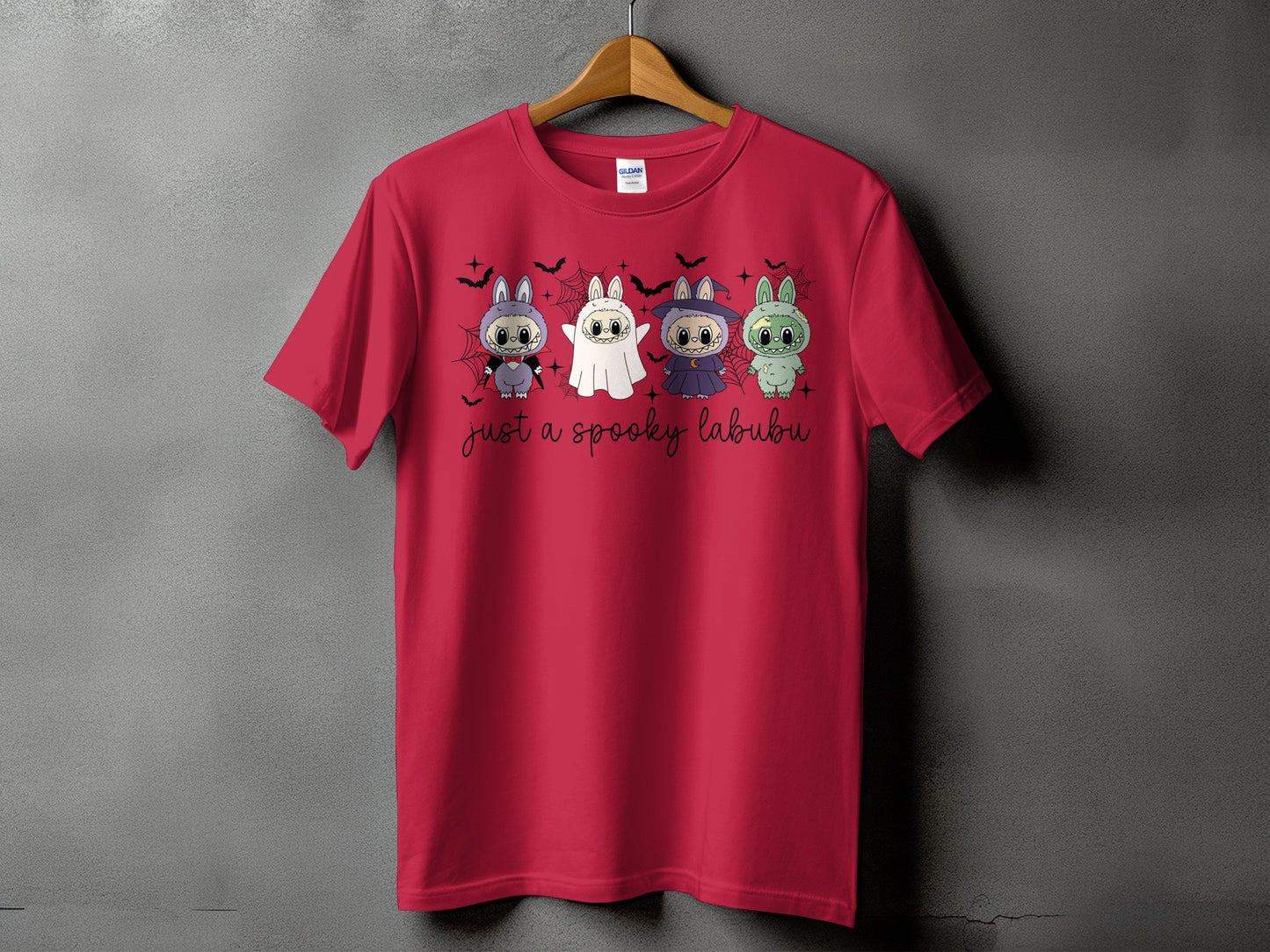 Red t-shirt with four cute Halloween characters and text "just a spooky labubu".