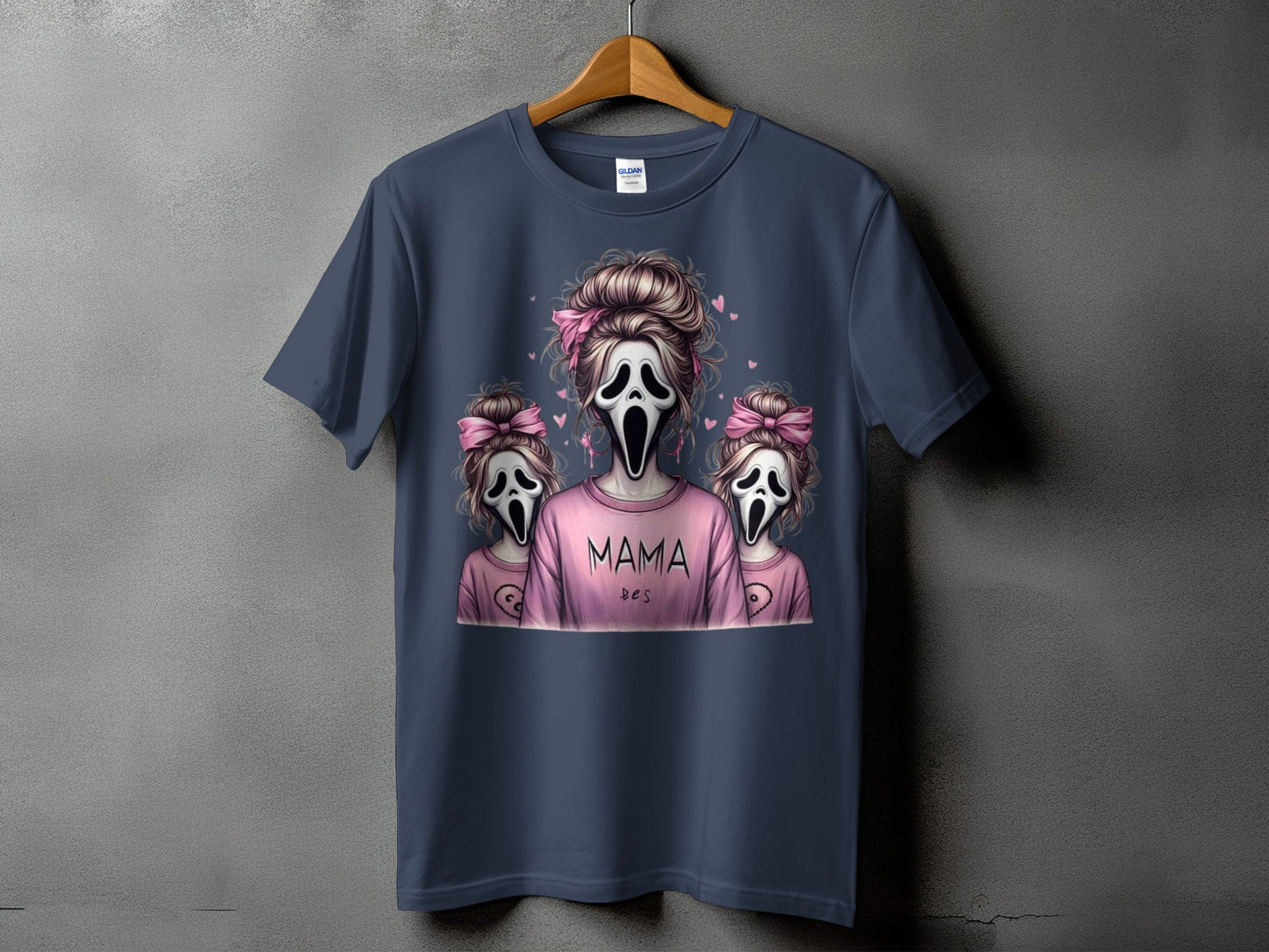 T-shirt with "Mama" and ghost characters wearing pink bows.