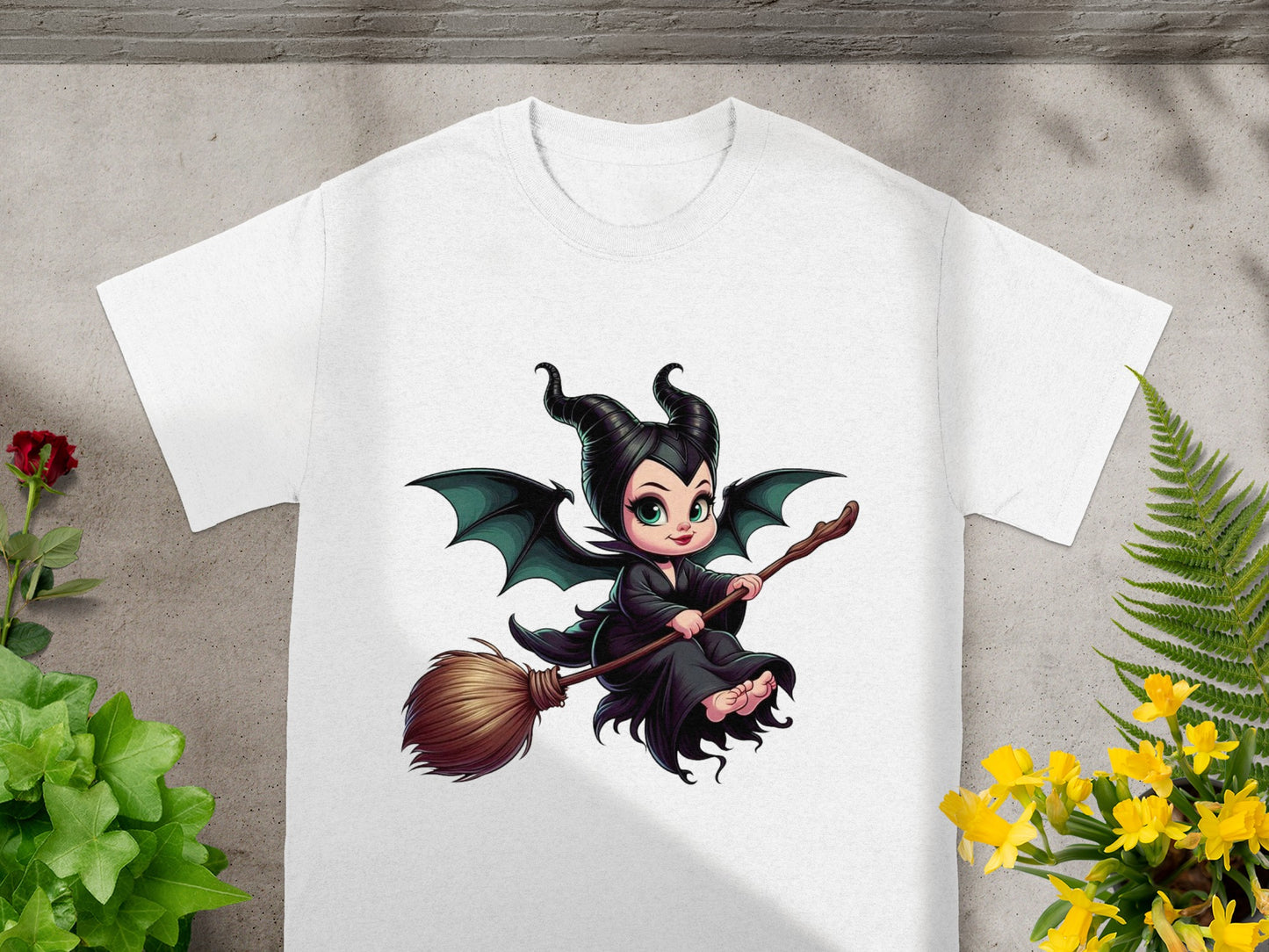 Cartoon baby Maleficent on a broomstick, with horns and wings.