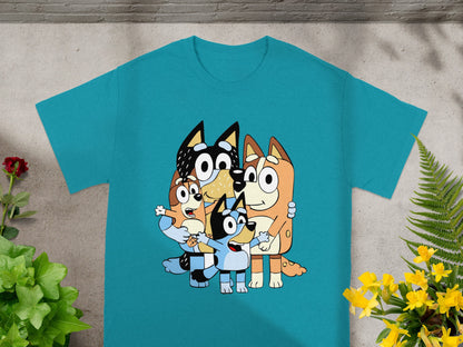 Bluey and Bingo family cartoon characters embracing on a teal t-shirt.
