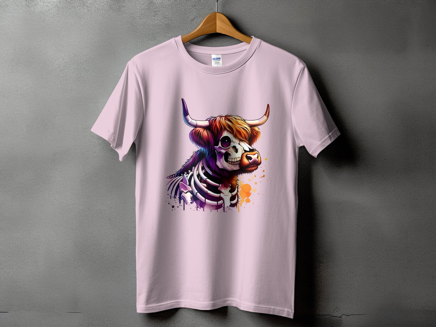 Light pink t-shirt with a watercolor skeleton bull design.