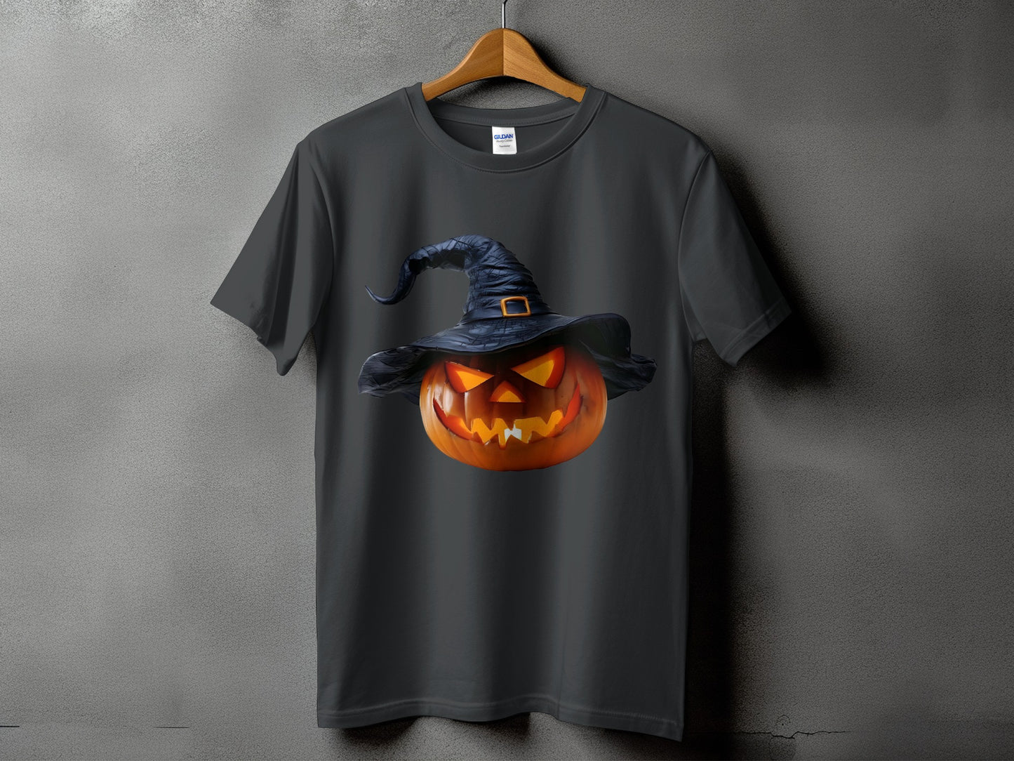 Dark gray t-shirt with a glowing jack-o'-lantern wearing a witch hat graphic.