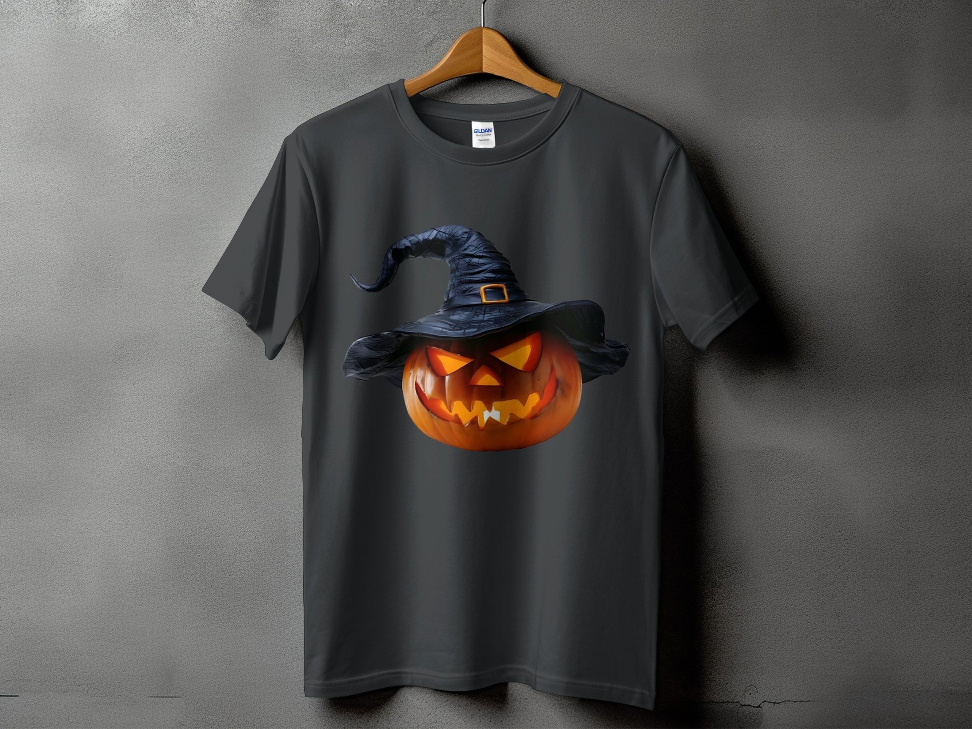 Dark gray t-shirt with a glowing jack-o'-lantern wearing a witch hat graphic.