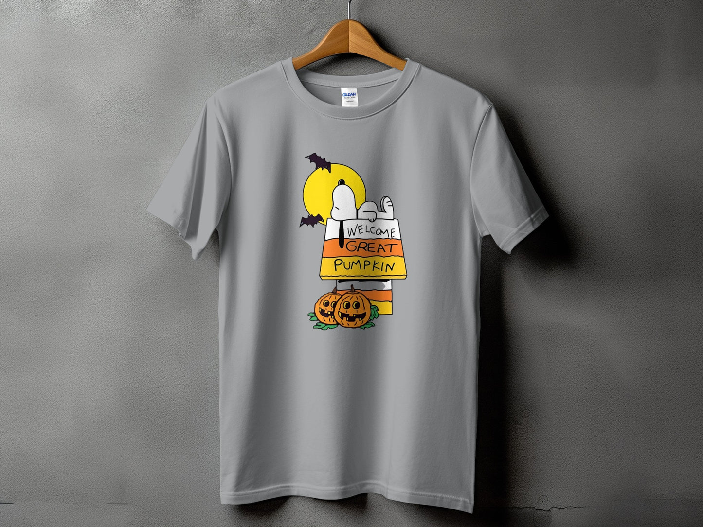 Grey t-shirt with Snoopy, candy corn, pumpkins, bats, and moon graphic.