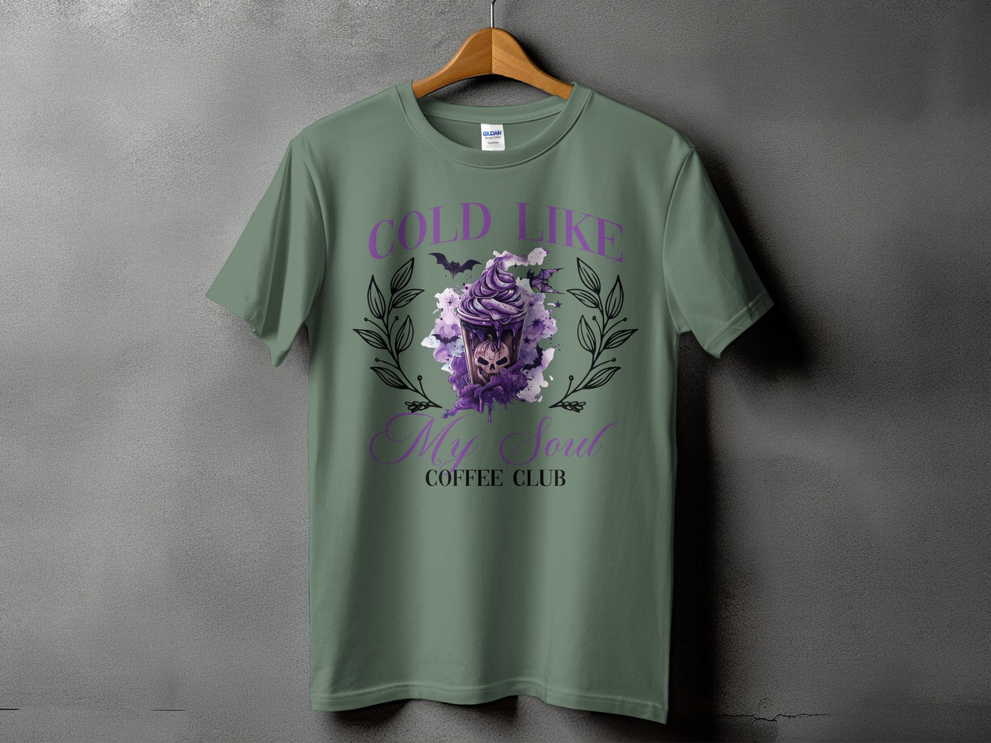 Green t-shirt with a purple skull ice cream design and text "COLD LIKE My Soul COFFEE CLUB".
