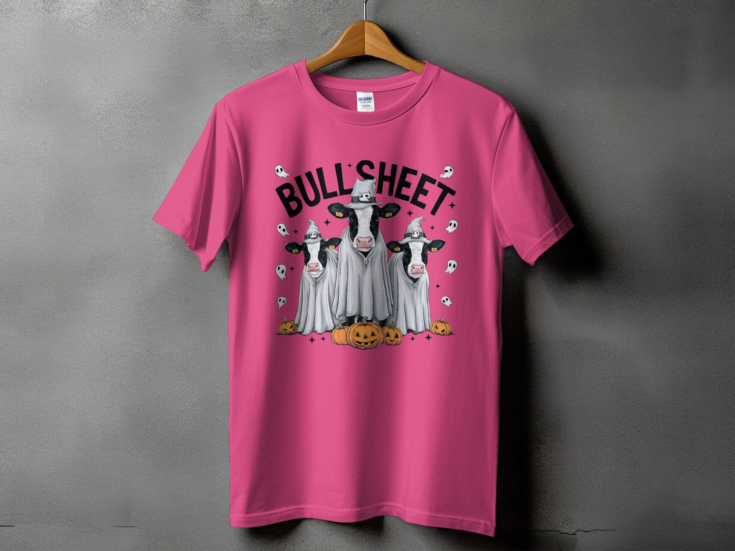 T-shirt with "BULL SHEET" text and three cows in ghost costumes with pumpkins.