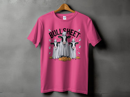 T-shirt with "BULL SHEET" text and three cows in ghost costumes with pumpkins.