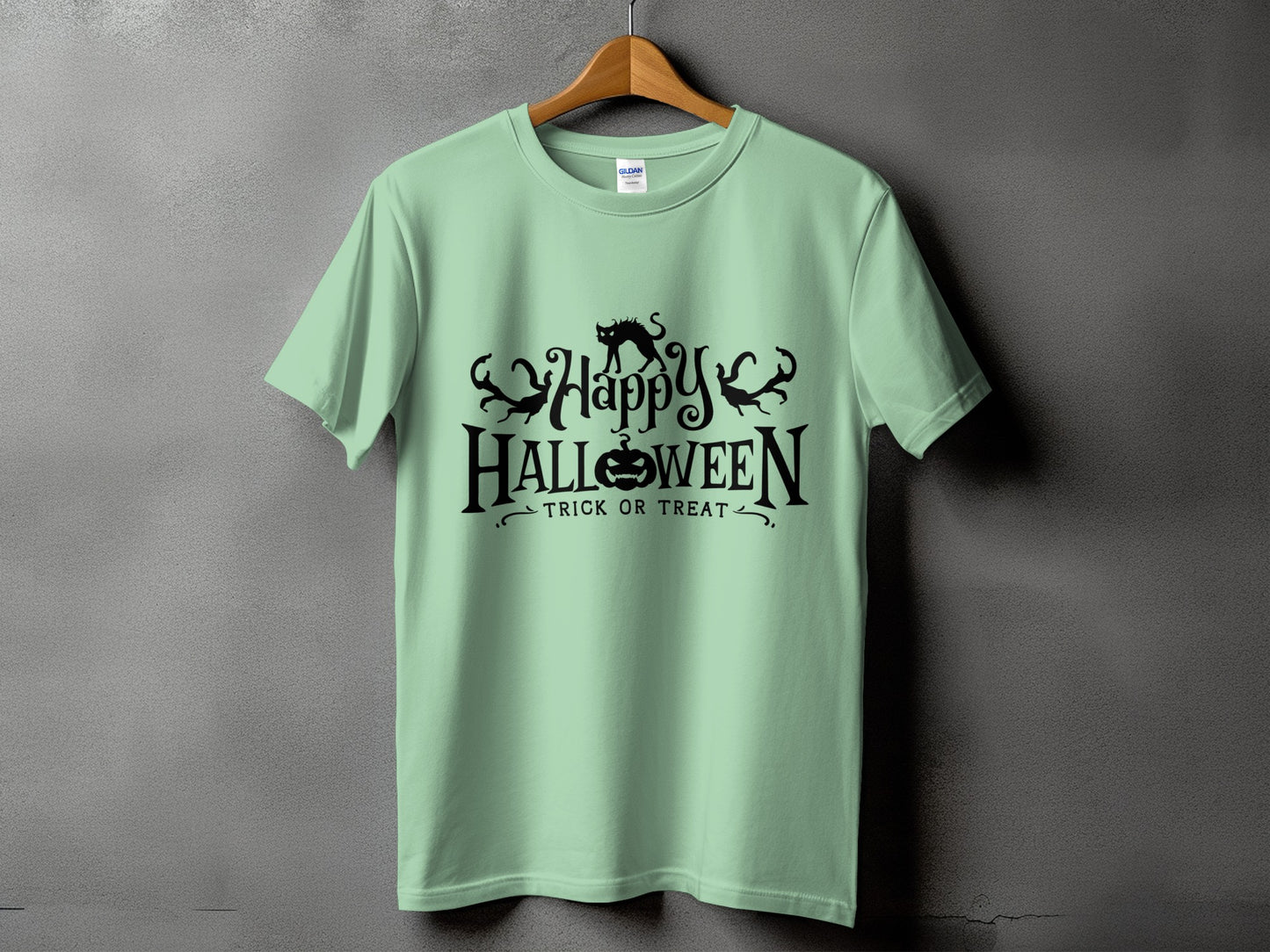 Light green t-shirt with black "Happy Halloween Trick or Treat" graphic.