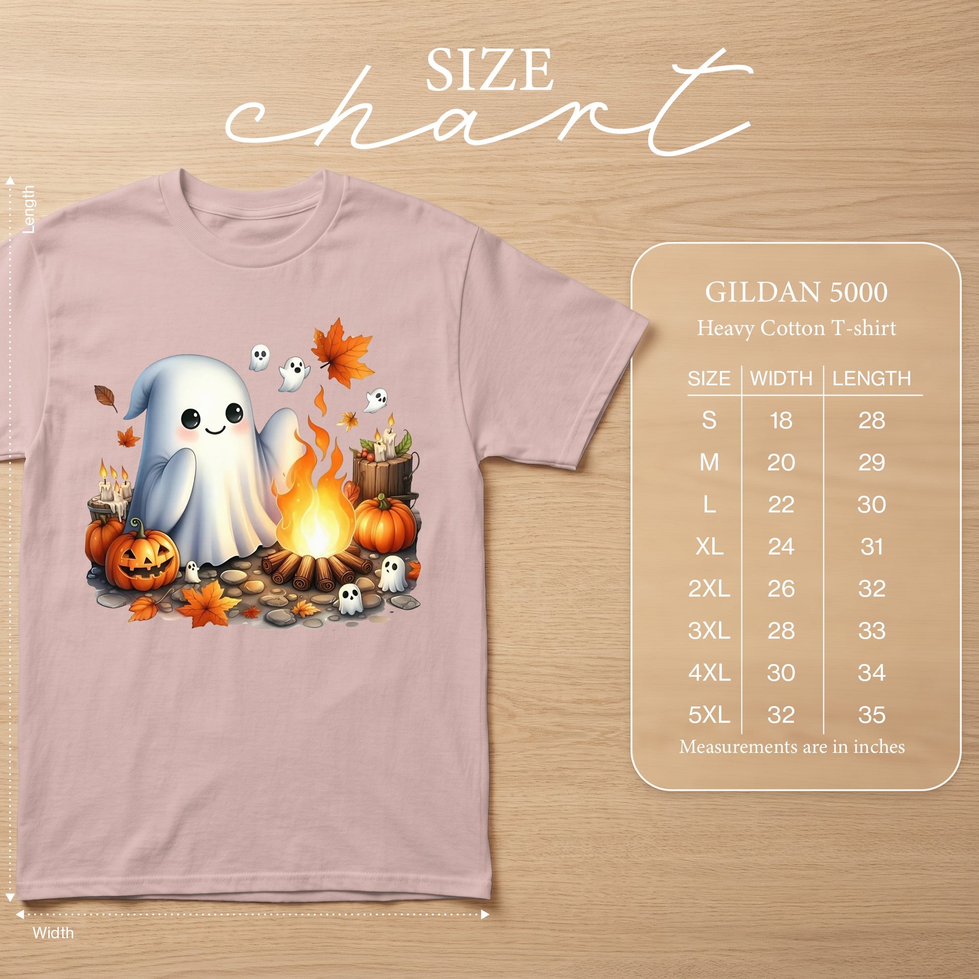 Pink t-shirt with ghost, pumpkins, campfire, and leaves graphic, with size chart.