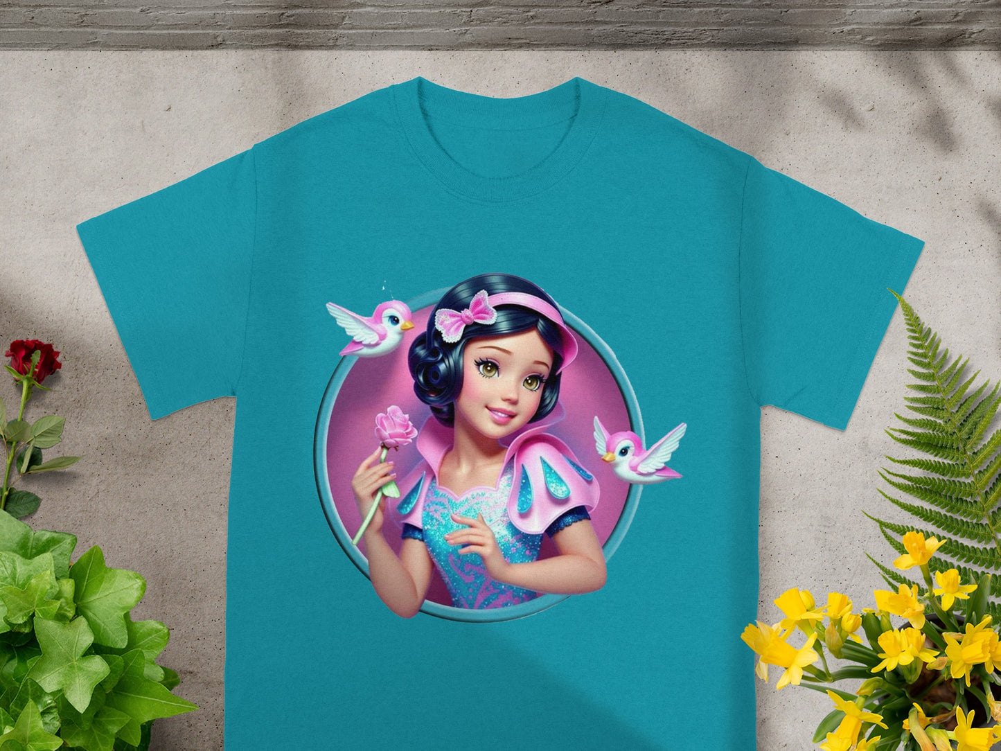 Turquoise t-shirt with Snow White illustration holding a pink rose.