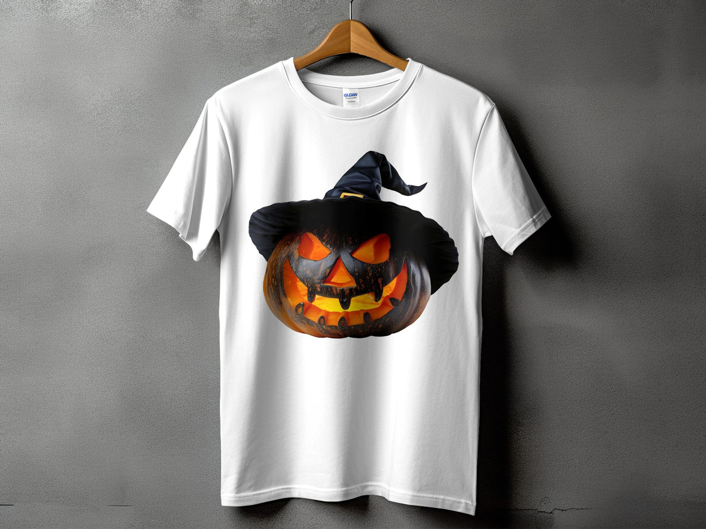 White t-shirt with a Jack-o'-lantern wearing a witch hat graphic.