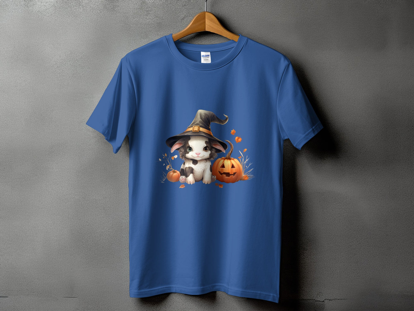 Blue t-shirt with a cartoon bunny in a witch hat and pumpkins for Halloween.