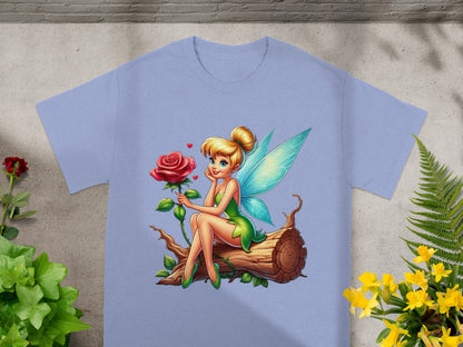 Tinkerbell sits on a log with a rose, wearing a green dress.